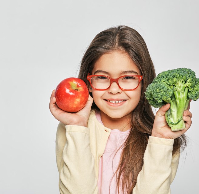 A girl promoting a healthy diet and dental care at Walton Way Ext., Augusta, Georgia.
